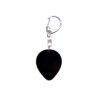 Alien head neon pink bag tag with black eyes and black backing.